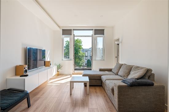 Stijlvol gerenoveerd en energiezuinig appartement (1 à 2 slpks) met balkon