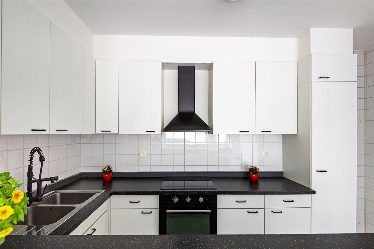 Smaakvol gerenoveerd appartement met terras en optionele garage