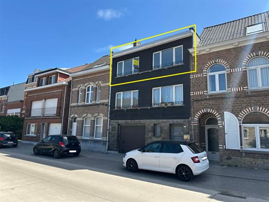 Appartement met 2 slaapkamers en garage.