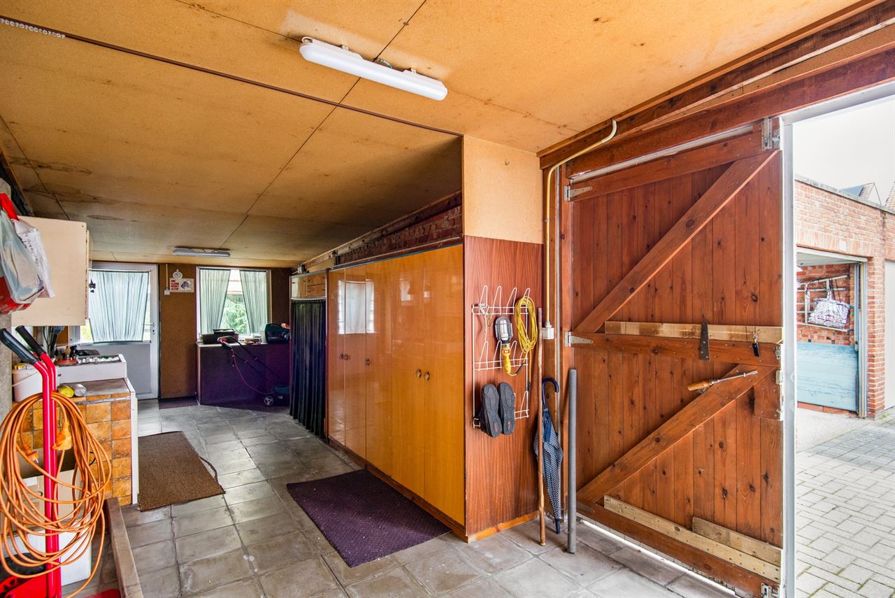 Op te frissen woning met praktische achteruitgang en tuin