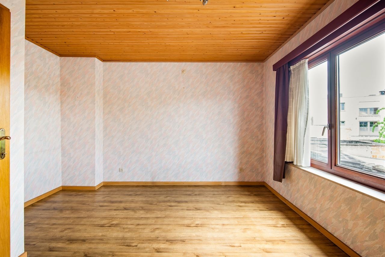 Op te frissen woning met praktische achteruitgang en tuin