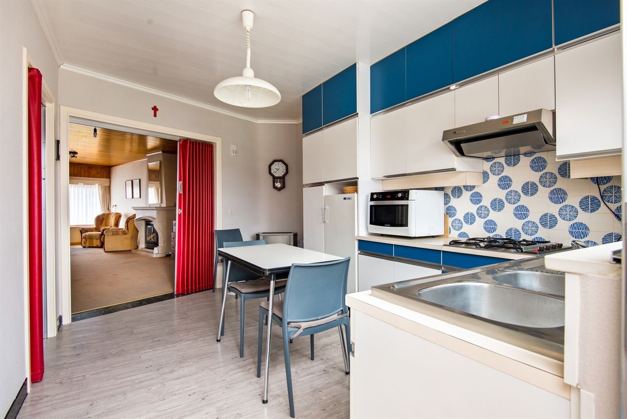 Op te frissen woning met praktische achteruitgang en tuin