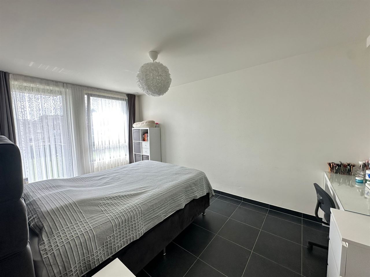 Prachtig 3-slaapkamer appartement met 2 terrassen en garage.