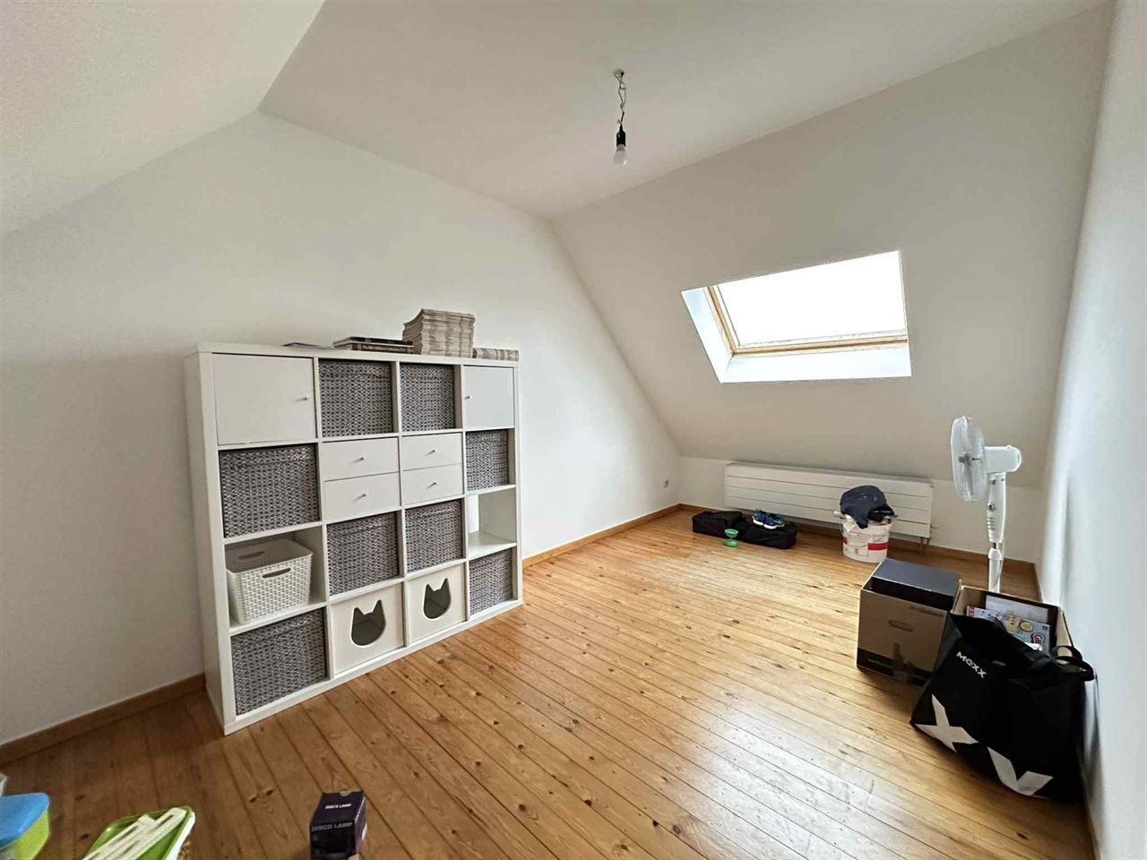 Rijwoning met 3 slaapkamers en ZW tuin.