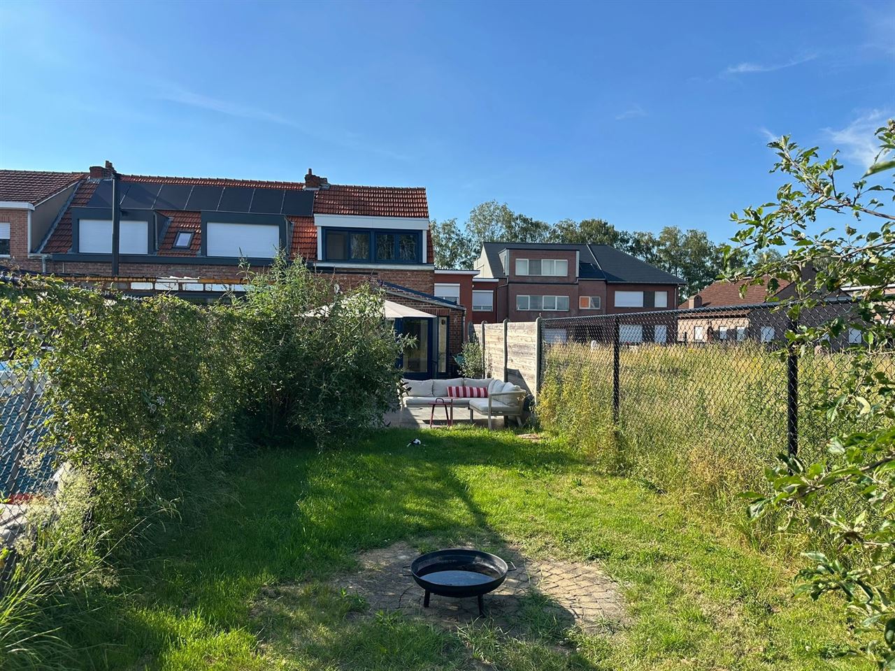 Charmante woning met 2 slaapkamers en tuin met zicht op groen.
