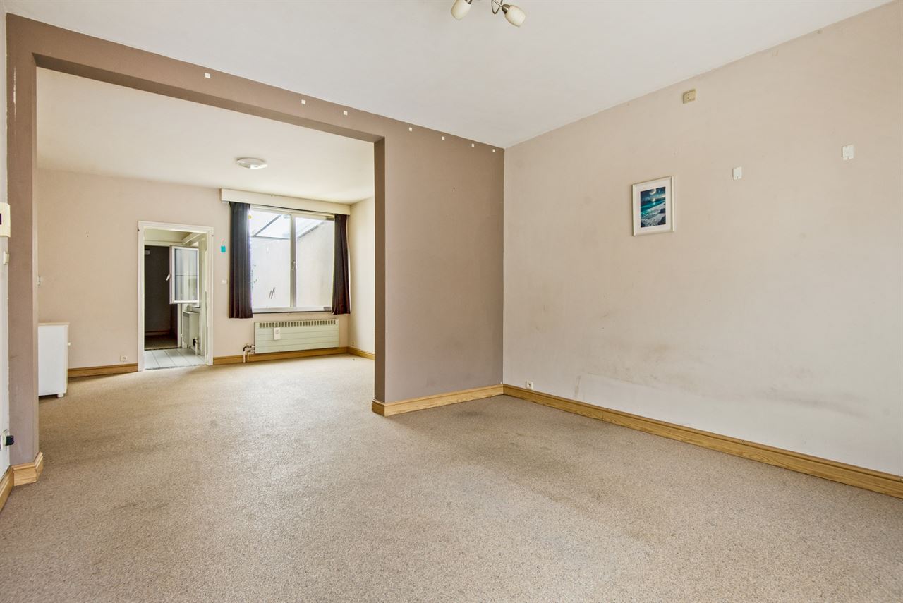 Gelijkvloers appartement met ruime tuin en geen gemeenschappelijke kosten