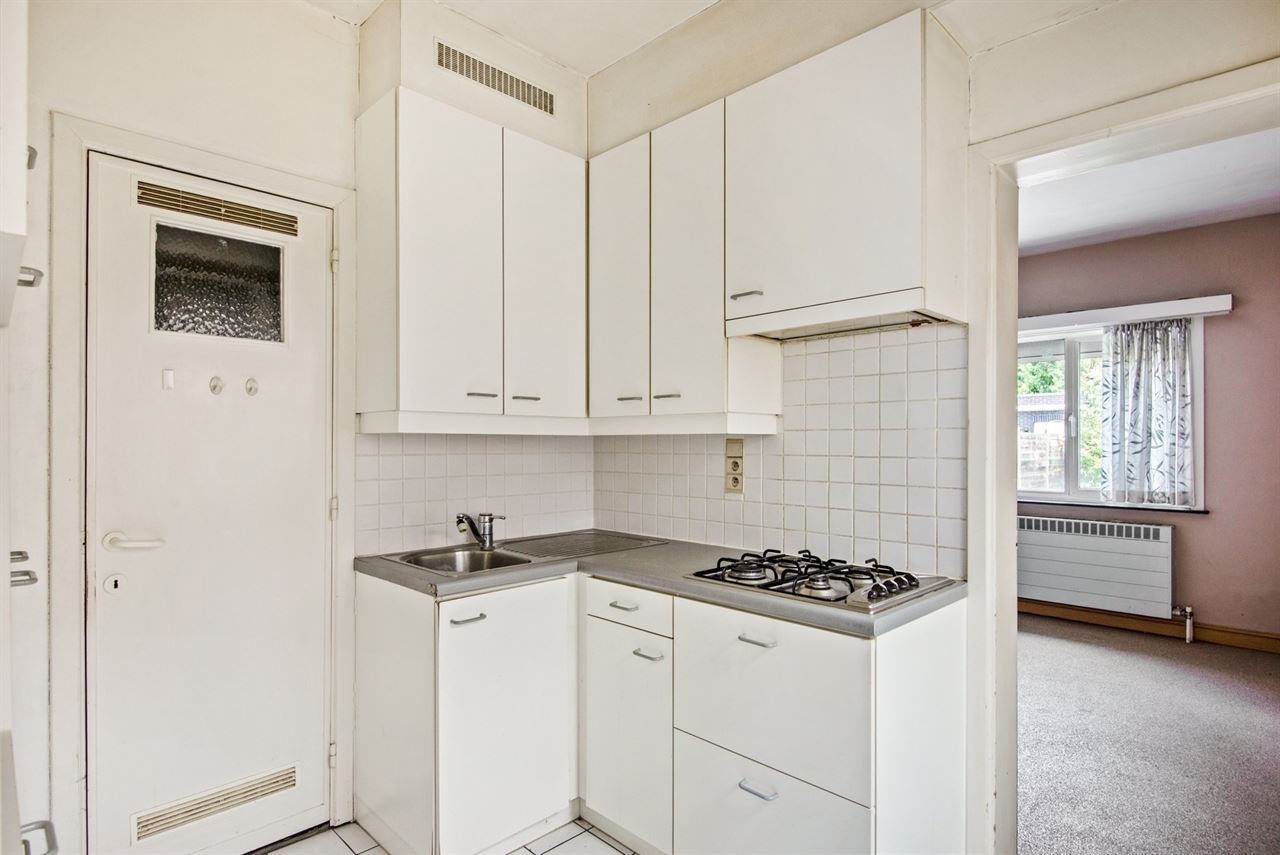 Gelijkvloers appartement met ruime tuin en geen gemeenschappelijke kosten