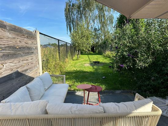 Charmante woning met 2 slaapkamers en tuin met zicht op groen.