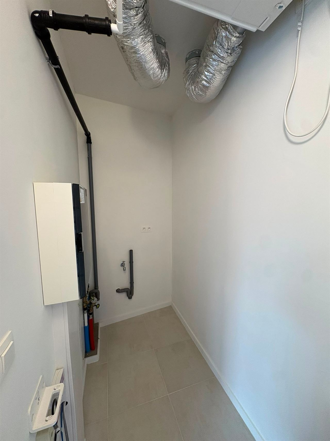 Modern gelijkvloers appartement met tuin, EPC A en autostaanplaats