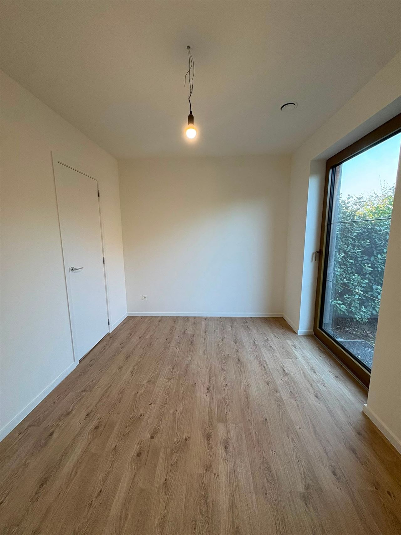 Modern gelijkvloers appartement met tuin, EPC A en autostaanplaats