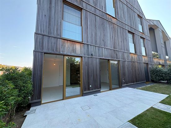 Modern gelijkvloers appartement met tuin, EPC A en autostaanplaats