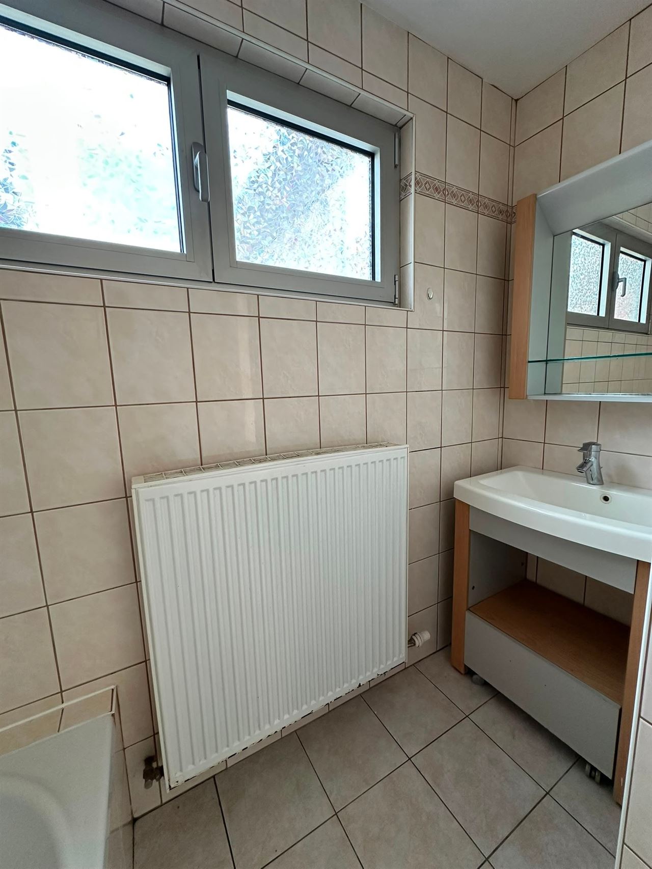 GLV appartement met 2 slpks, tuin en zij-ingang.