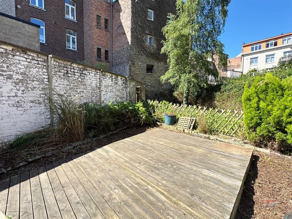 Immeuble de rapport de 3 appartements avec terrasse et jardin