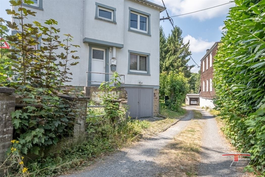 Immeuble de rapport de 2 appartements avec garage et jardinet