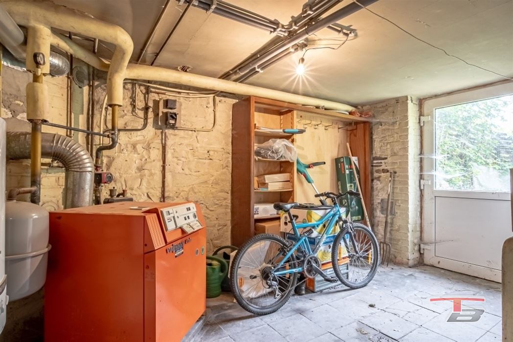 Immeuble de rapport de 2 appartements avec garage et jardinet