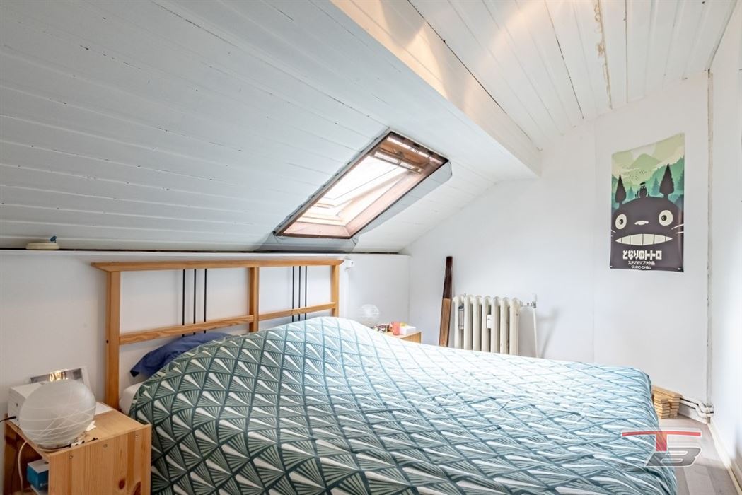 Immeuble de rapport de 2 appartements avec garage et jardinet