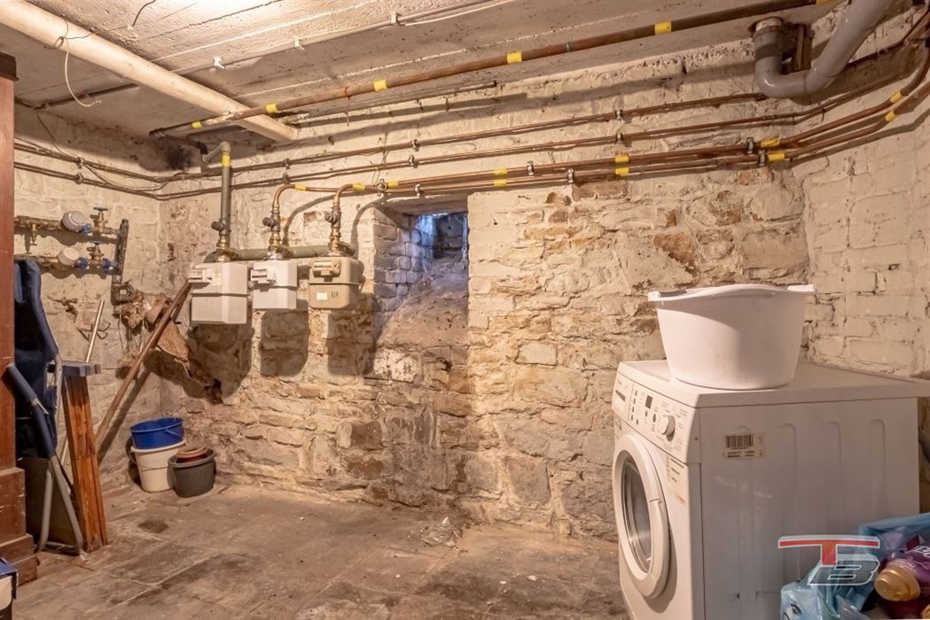 Immeuble de rapport de 2 appartements avec garage et jardinet