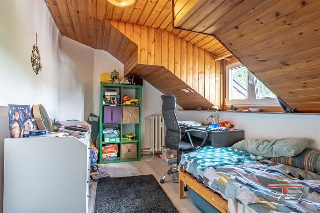 Immeuble de rapport de 2 appartements avec garage et jardinet