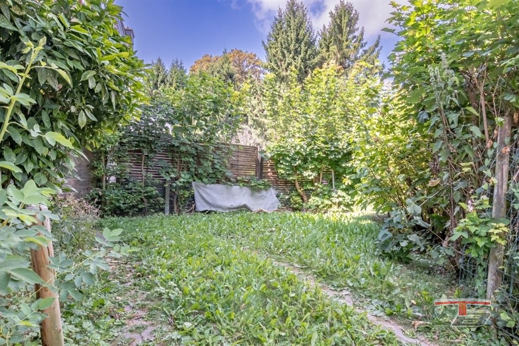 Immeuble de rapport de 2 appartements avec garage et jardinet