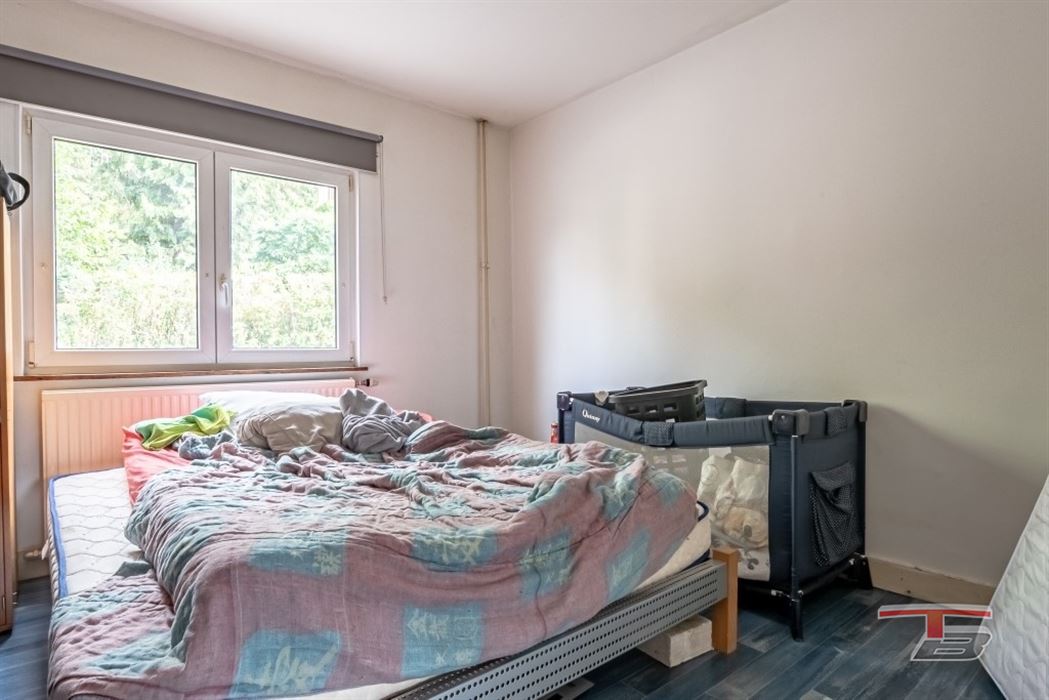 Immeuble de rapport de 2 appartements avec garage et jardinet