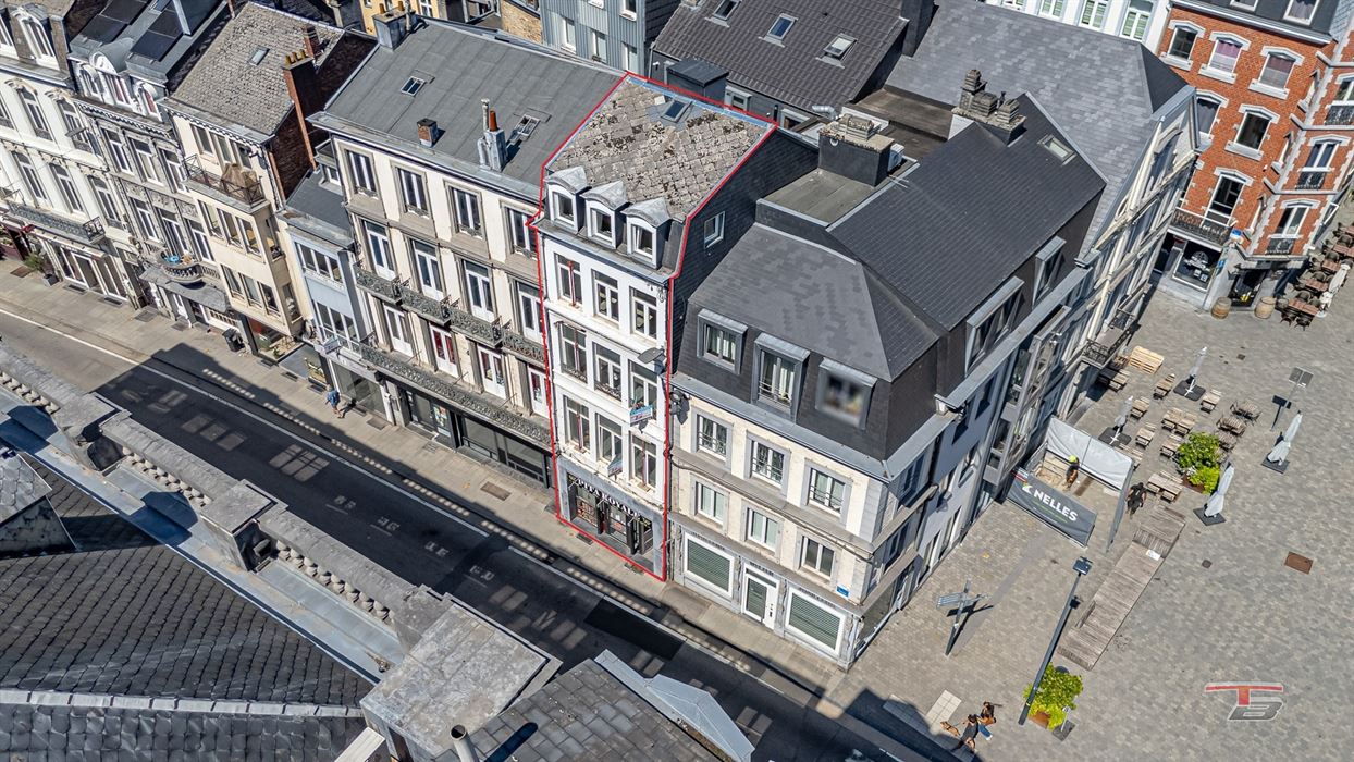 Immeuble de rapport mixte (commerce+ 2 apparts) situé au centre-ville.