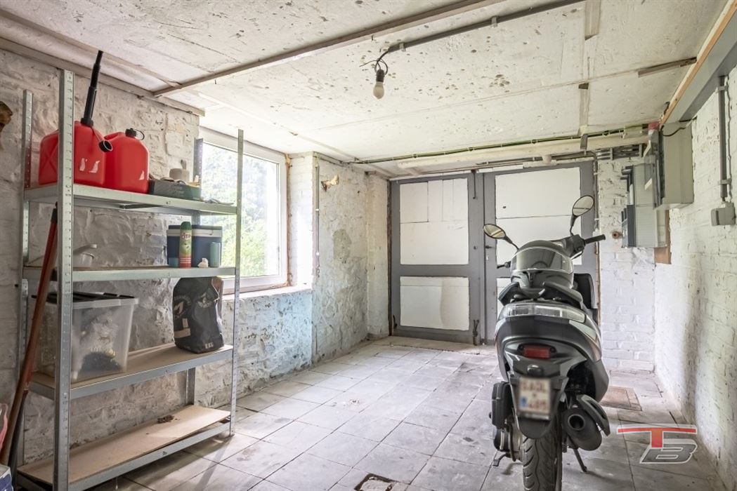 Immeuble de rapport de 2 appartements avec garage et jardinet