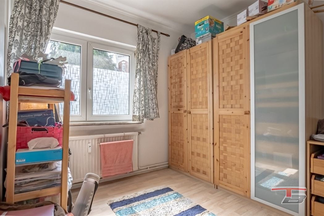 Immeuble de rapport de 2 appartements avec garage et jardinet