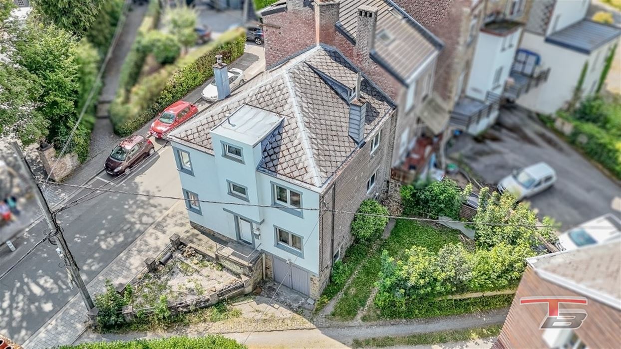 Immeuble de rapport de 2 appartements avec garage et jardinet