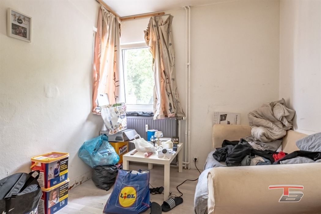 Immeuble de rapport de 2 appartements avec garage et jardinet