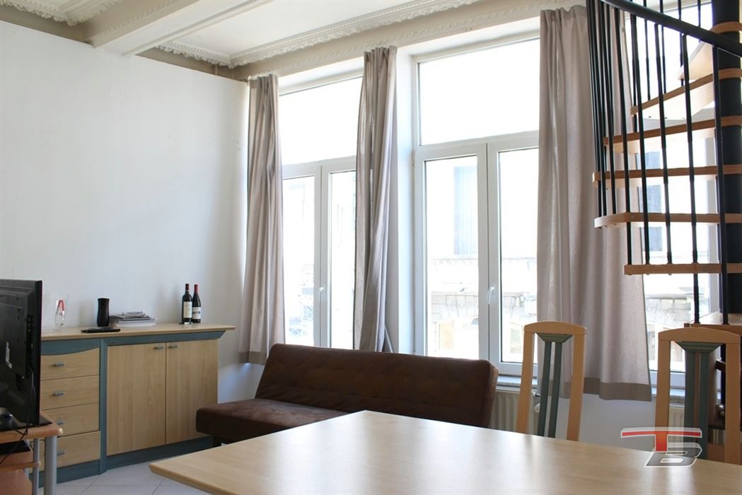 Immeuble de rapport mixte (commerce+ 2 apparts) situé au centre-ville.