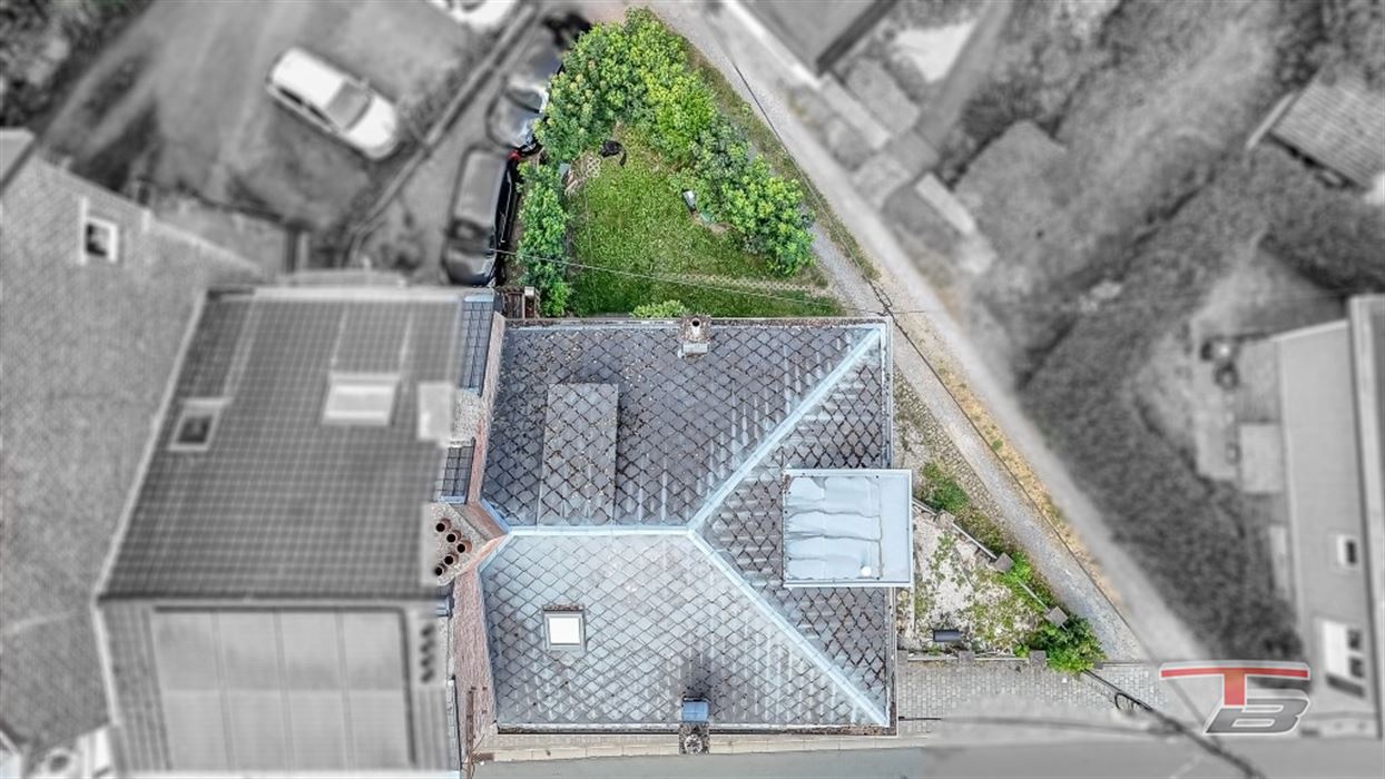 Immeuble de rapport de 2 appartements avec garage et jardinet
