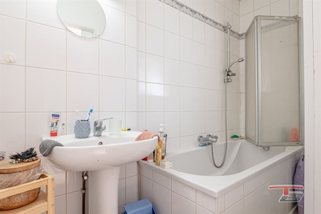 Immeuble de rapport de 2 appartements avec garage et jardinet