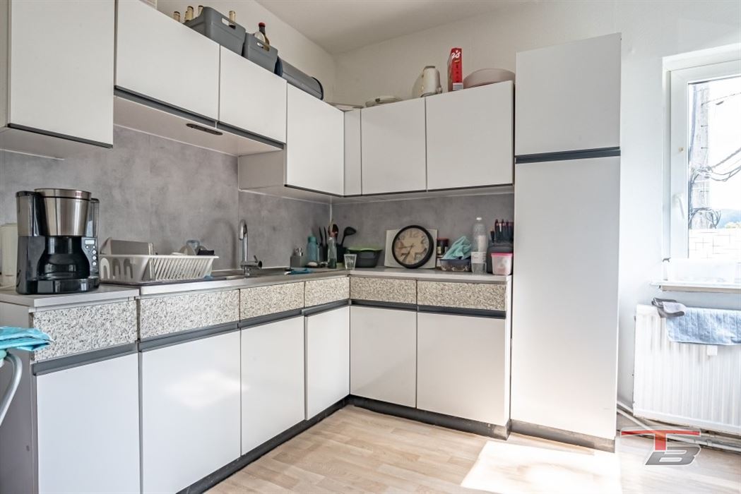 Immeuble de rapport de 2 appartements avec garage et jardinet