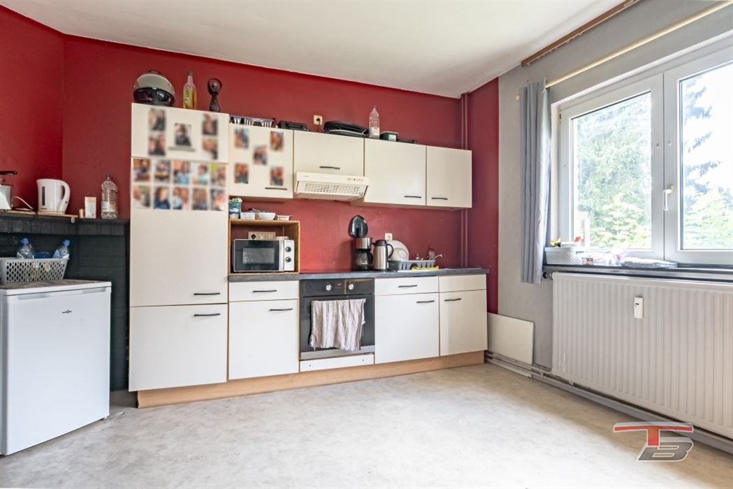 Immeuble de rapport de 2 appartements avec garage et jardinet