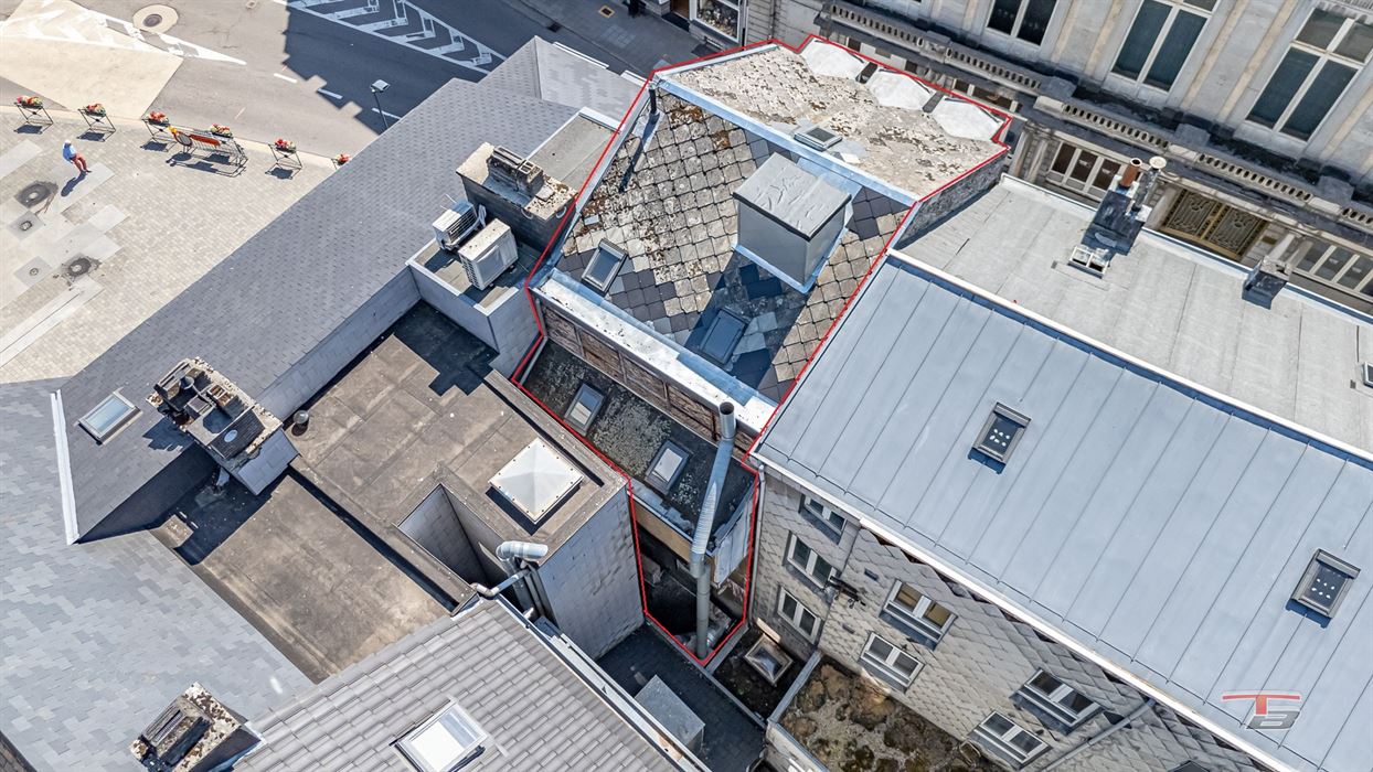 Immeuble de rapport mixte (commerce+ 2 apparts) situé au centre-ville.