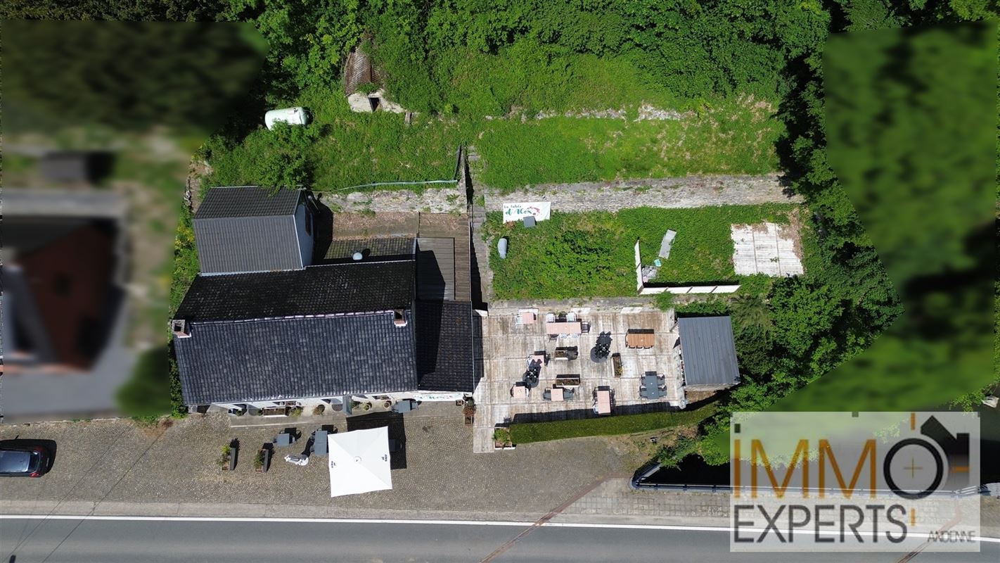 Maison avec commerce en rez de chaussée