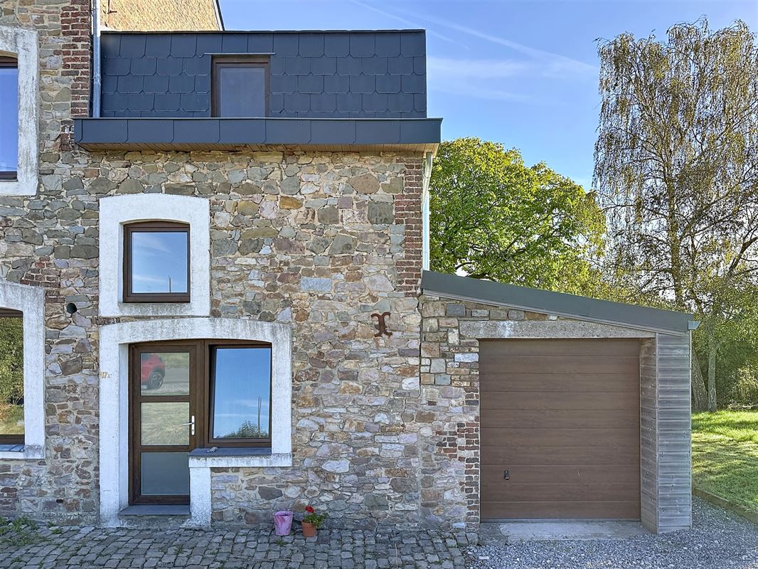 Maison rénovée avec garage et jardin à Coutisse