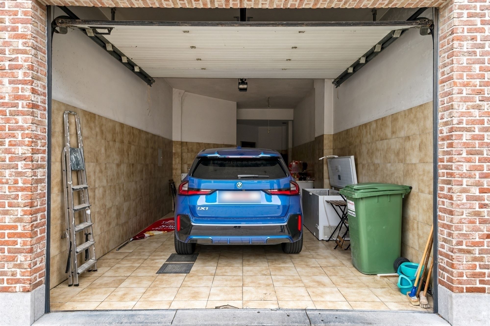 Opbrengsteigendom - 2 appartementen + handelspand te Lier