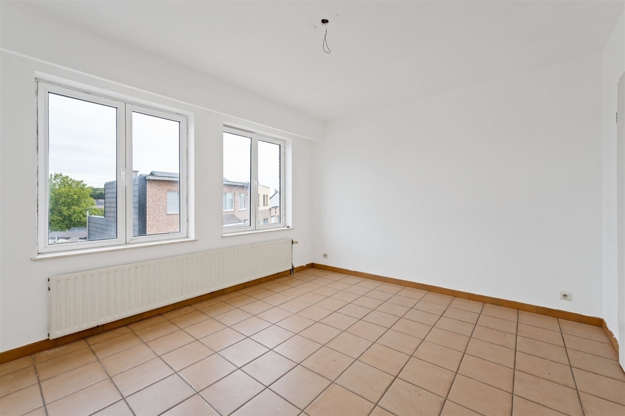 Opbrengsteigendom - 2 appartementen + handelspand te Lier