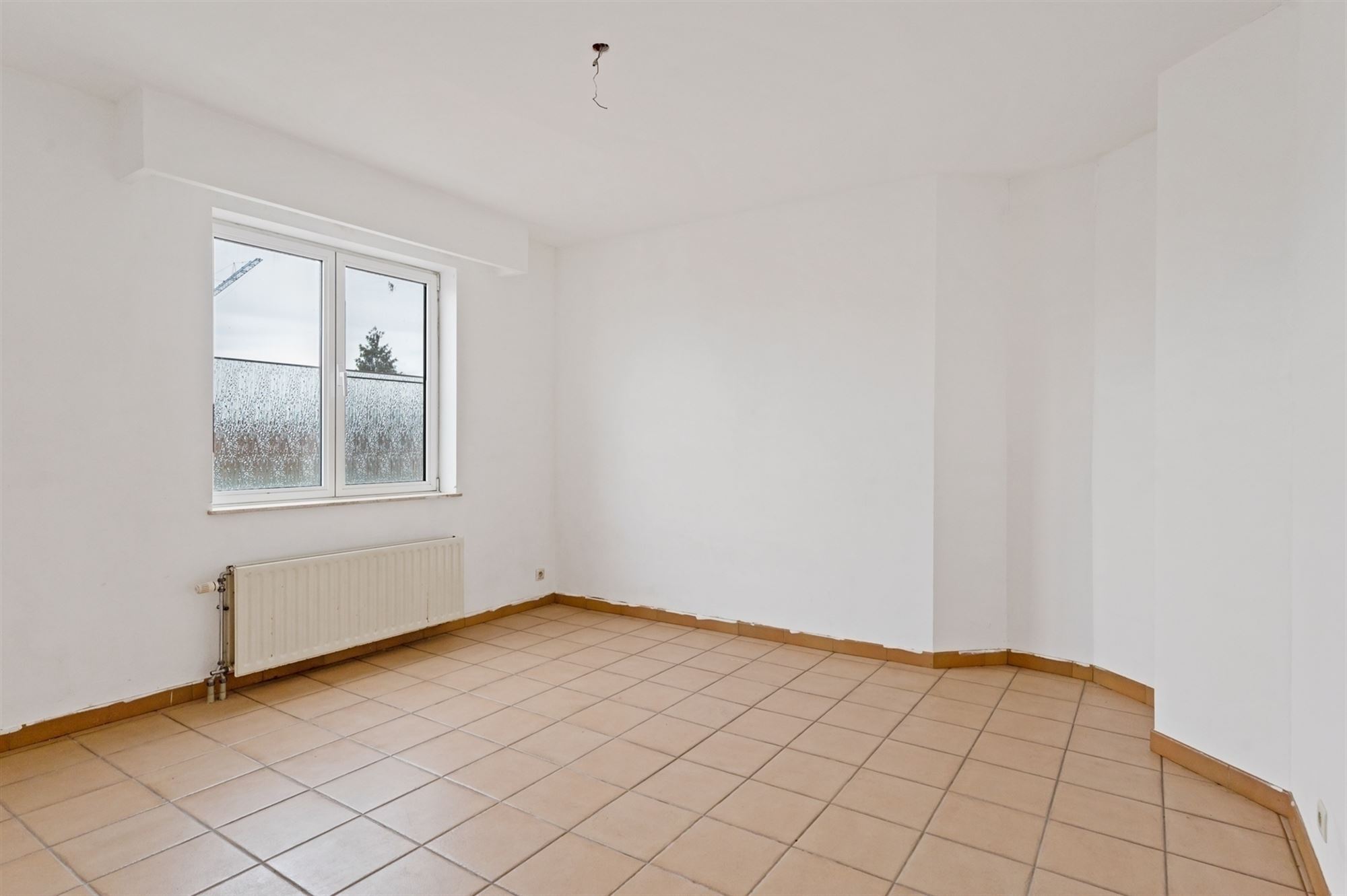 Opbrengsteigendom - 2 appartementen + handelspand te Lier