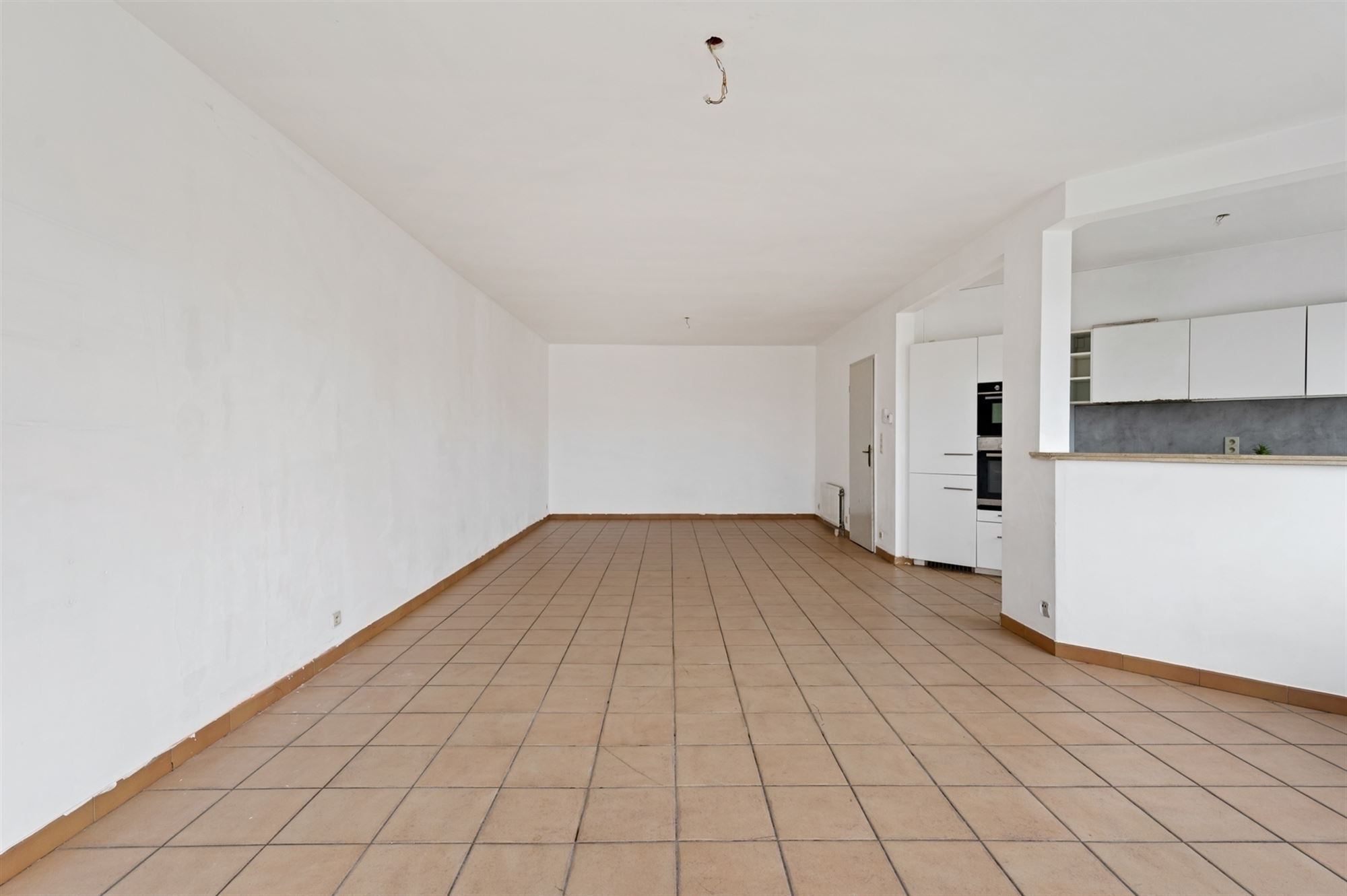 Opbrengsteigendom - 2 appartementen + handelspand te Lier