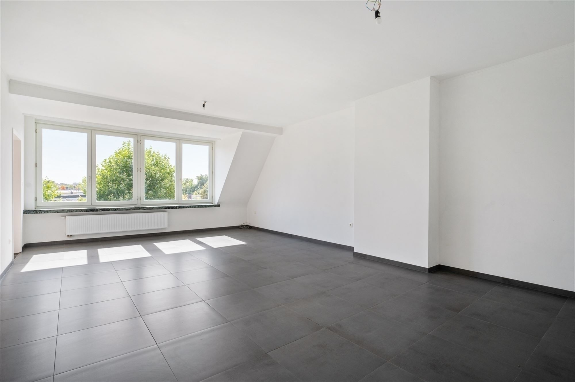 Gerenoveerd en lichtrijk appartement te Mechelen