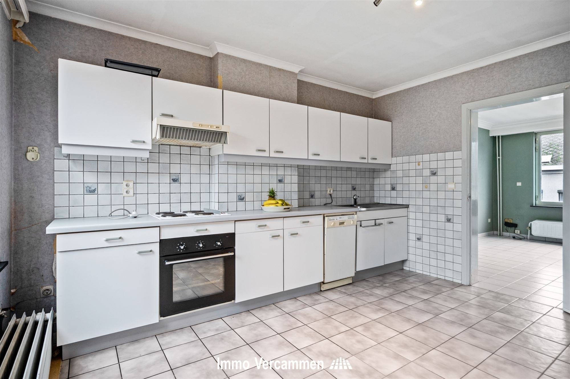 Opbrengsteigendom ingericht met 2 appartementen in het centrum van Putte