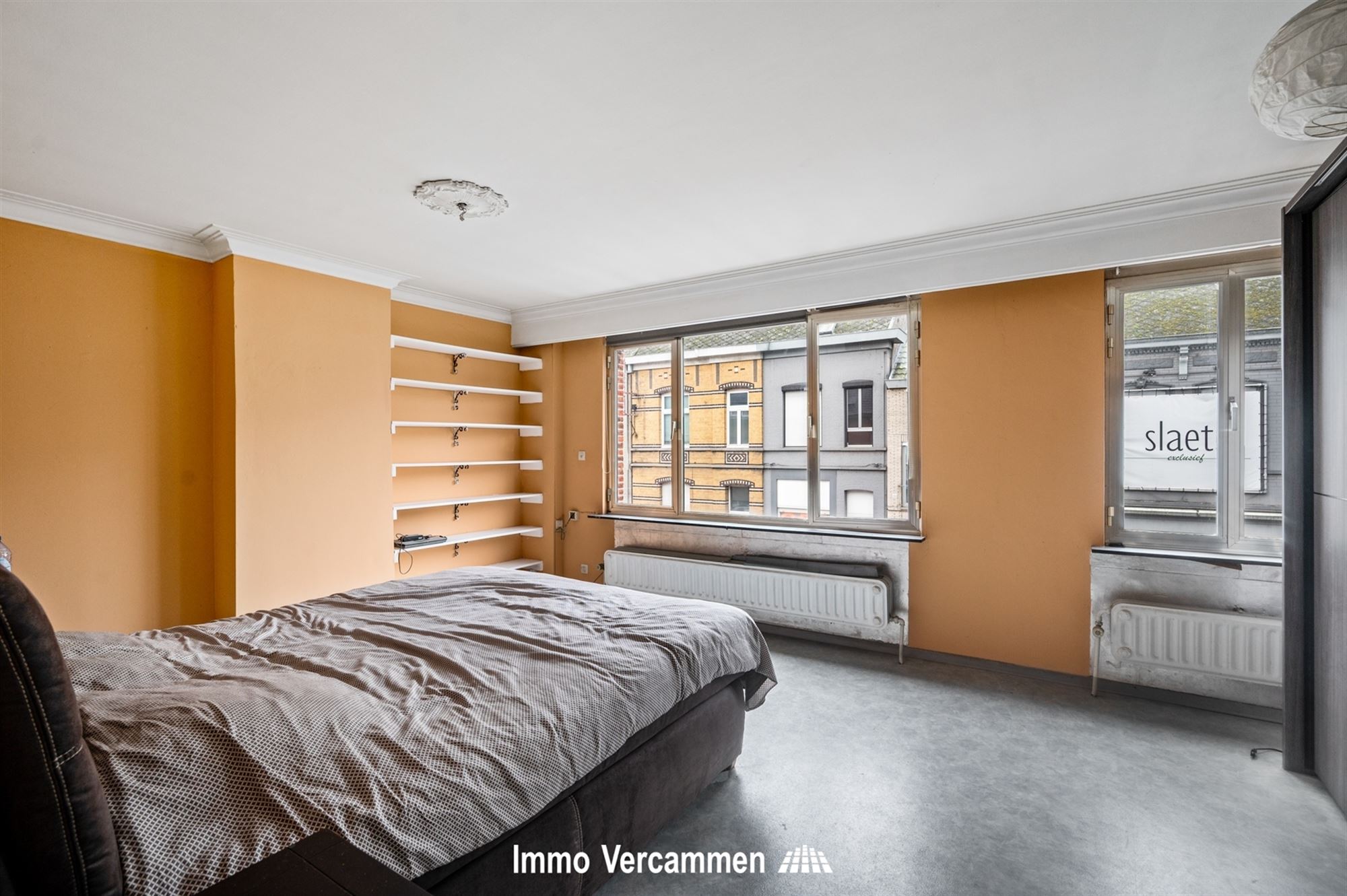 Opbrengsteigendom ingericht met 2 appartementen in het centrum van Putte