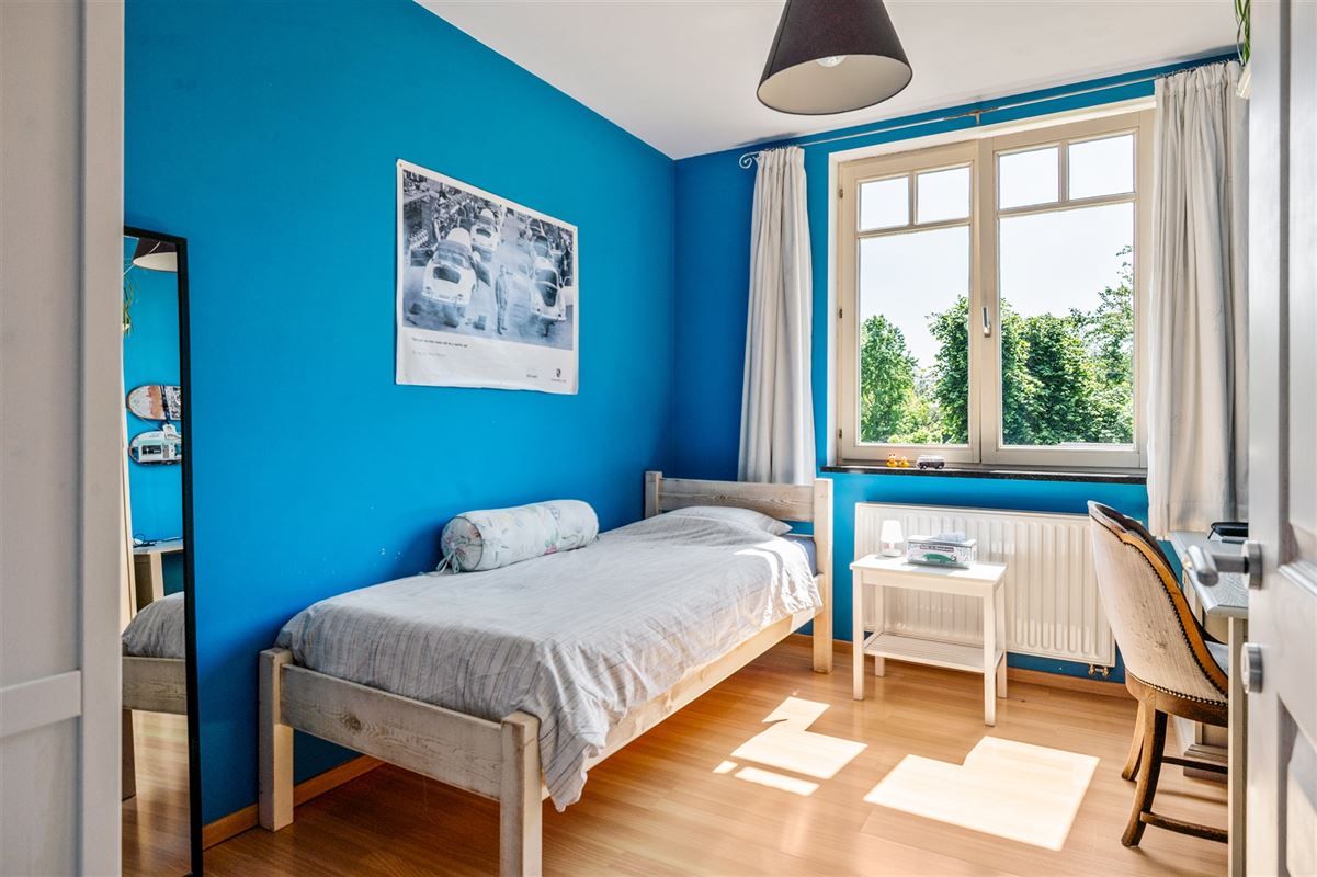 Elegante herenwoning met 4 slaapkamers, ruime zolder en zonnige tuin in Koningshooikt