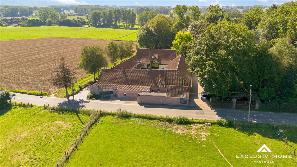 Authentic square farmhouse with work and office spaces