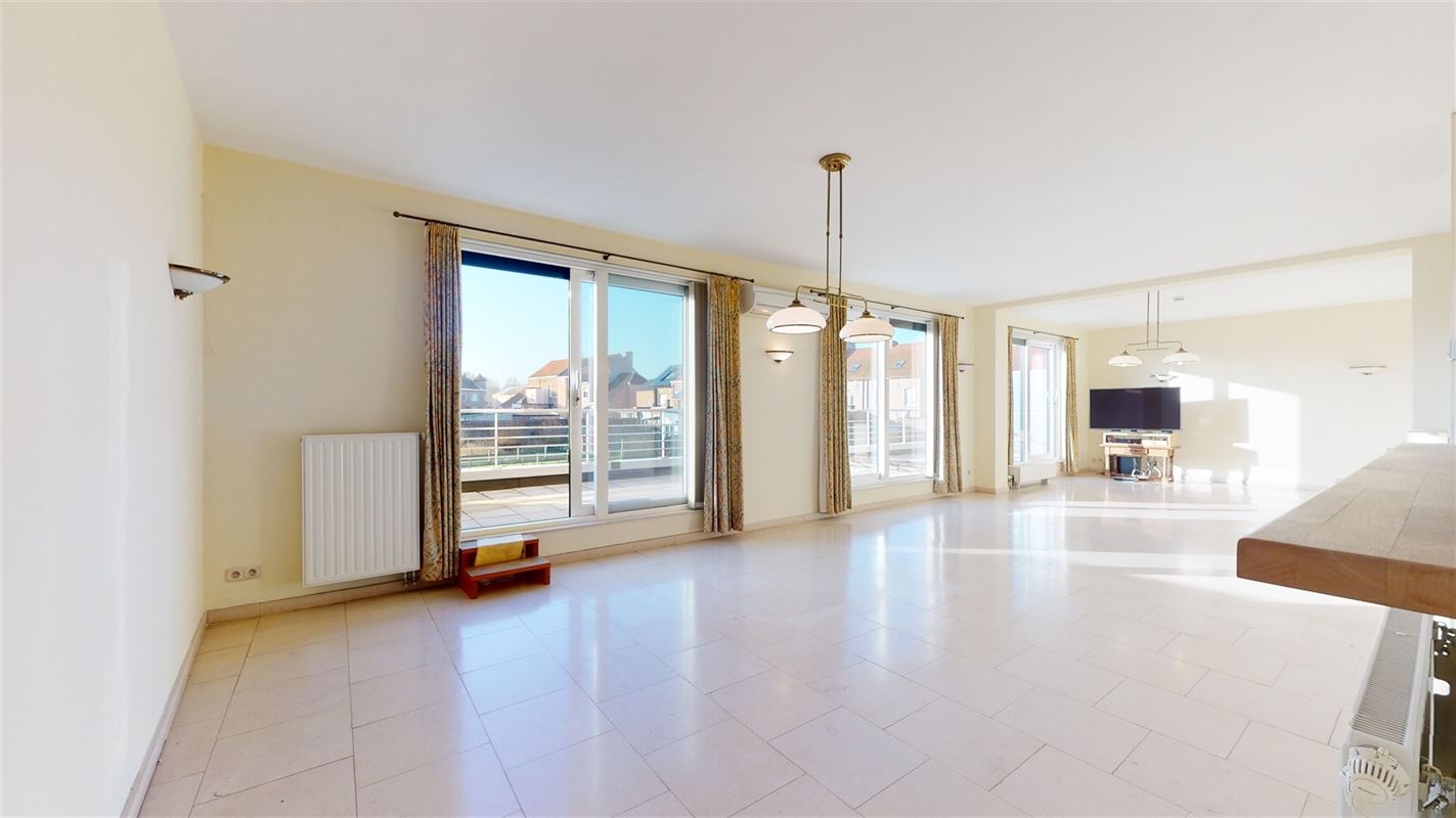 Appartement met staanplaats, zonneterras en airco