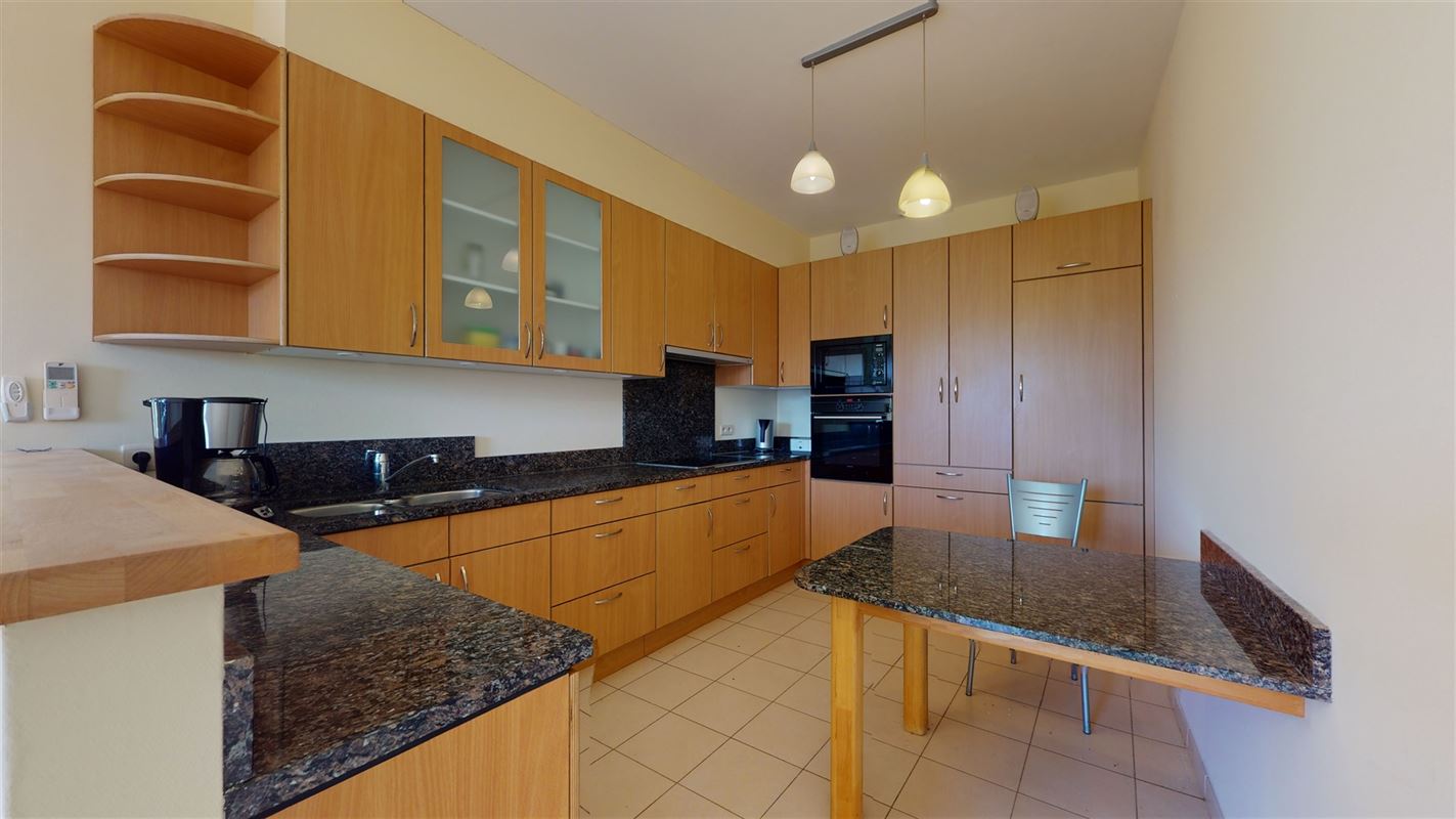 Appartement met staanplaats, zonneterras en airco