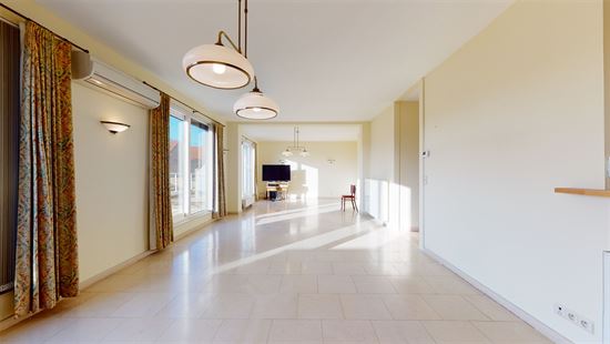 Appartement met staanplaats, zonneterras en airco
