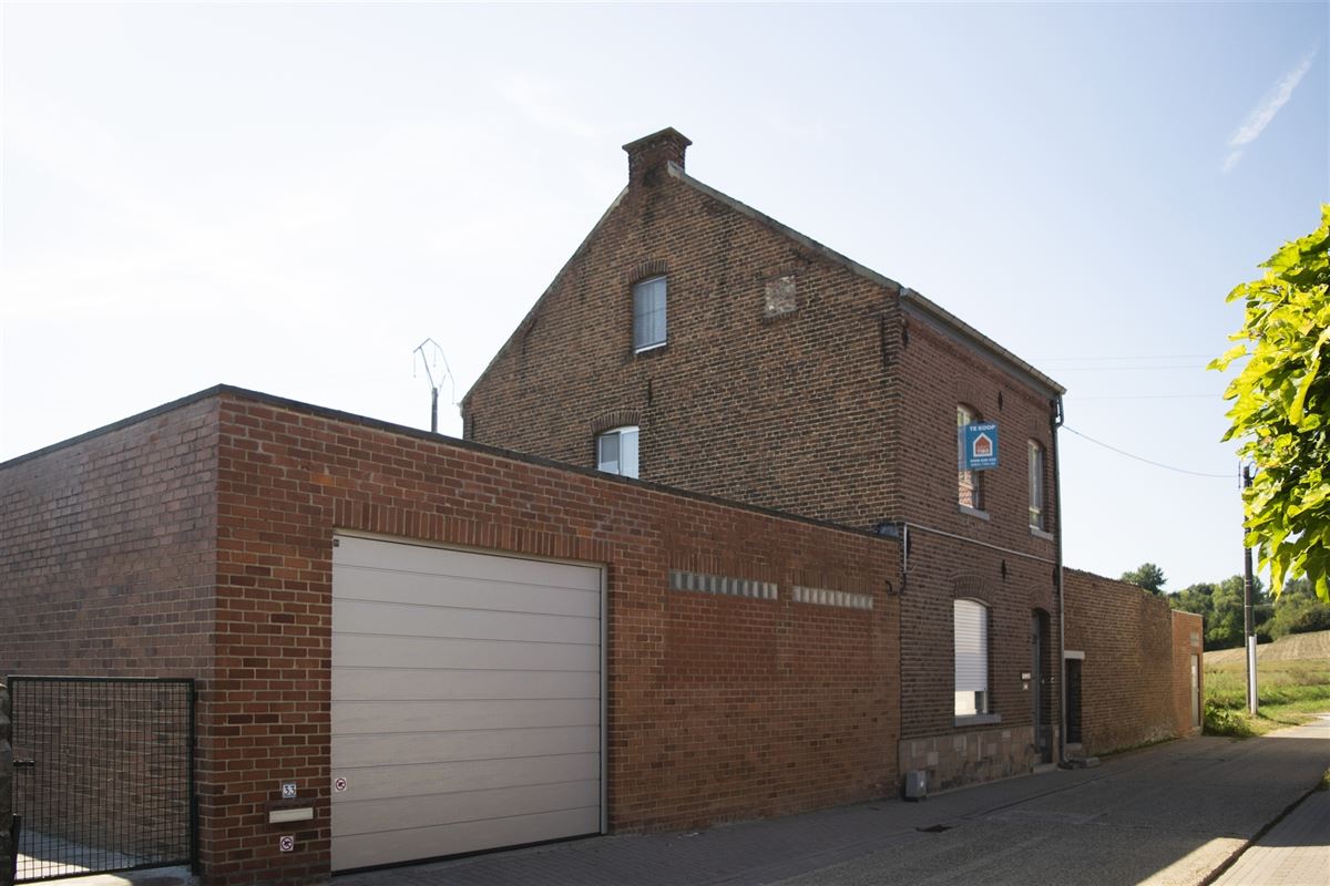Landelijke woning met zonnepanalen, garage en tuin